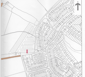Property for sale by Auction A black and white map displays a residential neighborhood with numerous houses and streets. The map includes a highlighted red rectangle among a cluster of rectangular plots on the left side. An arrow in the upper right corner indicates the north direction. Presented by World of Auctions