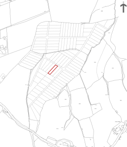 A black-and-white map shows divided plots of land, with PLOT C38 DUNDRY LANE Bristol highlighted in red near the center. Roads and landscape features are also depicted. An arrow indicating the north direction is present in the upper right corner. This plot was sold by World of Auctions.
